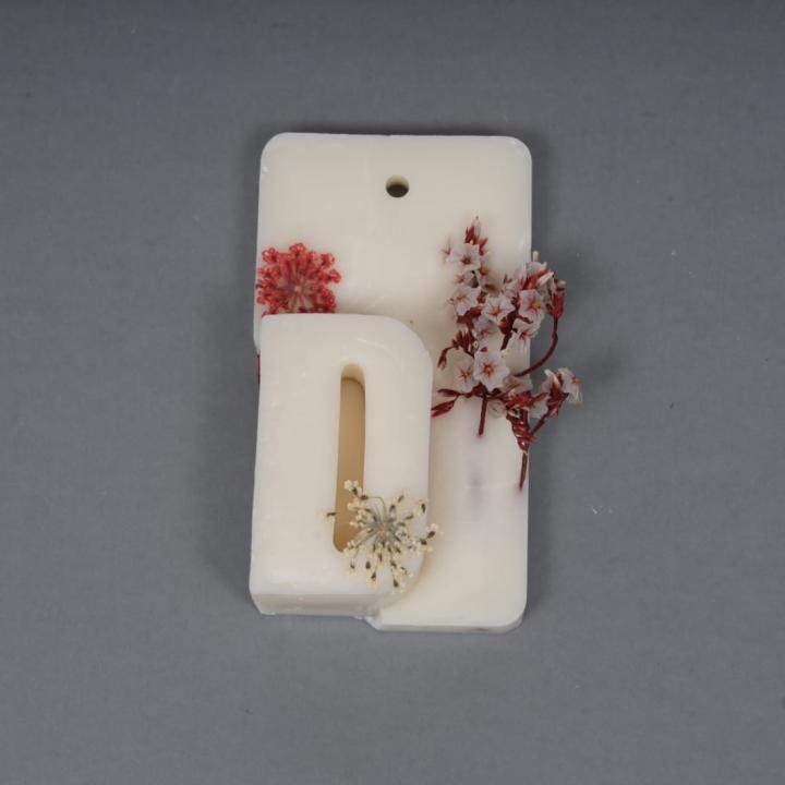 Aroma wax charm with later